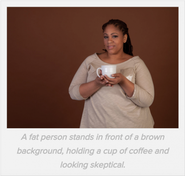 a fat woman holds a cup of coffee